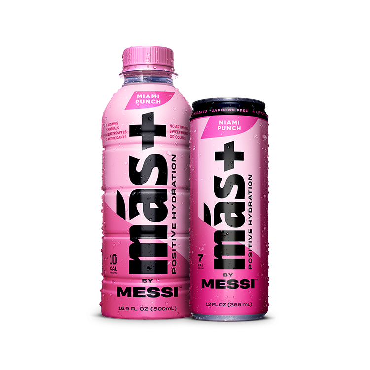 A pink 16.9 fl oz (500ml) plastic bottle and a pink 12 fl oz (355ml) aluminum can of "Más+ Positive Hydration by Messi" in the "Miami Punch" flavor. The bottle has a screw cap, while the can has a sleek, slim design with condensation droplets. Both emphasize features like no artificial sweeteners, caffeine-free, and containing electrolytes and antioxidants. The background is transparent.