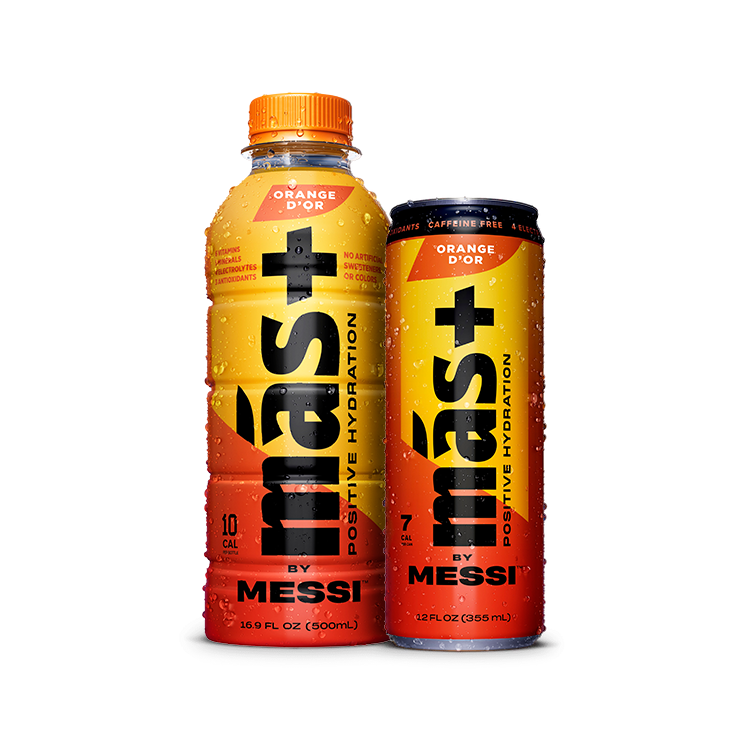 An orange 16.9 fl oz (500ml) plastic bottle and an orange 12 fl oz (355ml) aluminum can of "Más+ Positive Hydration by Messi" in the "Orange d'Or" flavor. The bottle has a screw cap, while the can has a sleek, slim design with condensation droplets. Both emphasize features like no artificial sweeteners, caffeine-free, and containing electrolytes and antioxidants. The background is transparent.