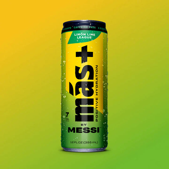 A green can of "Más+ Positive Hydration by Messi" with water droplets on its surface, featuring the flavor "Berry Copa Crush" and a gradient green background.