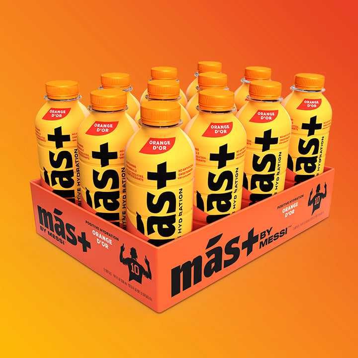 A neatly arranged 12-pack of protein drinks in strong yellow bottles with orange caps, featuring the bold black text "Más+" and the brand "Messi." The packaging is orange with black branding, and the background has a gradient orange effect.